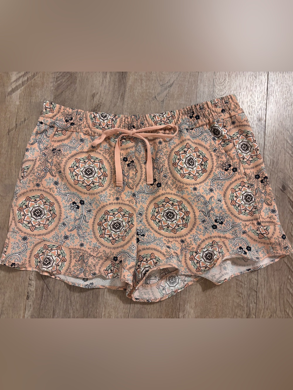 Loft peach-colored pull-on shorts with ruffle hems
